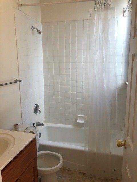 Bathroom with tub and shower