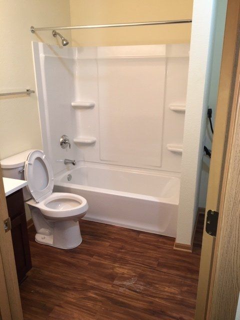Bathroom with tub and shower.