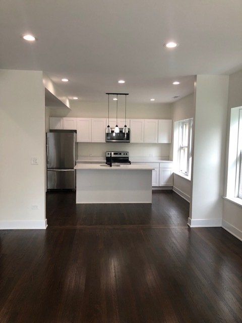 Renovated kitchen with stainless steel appliances