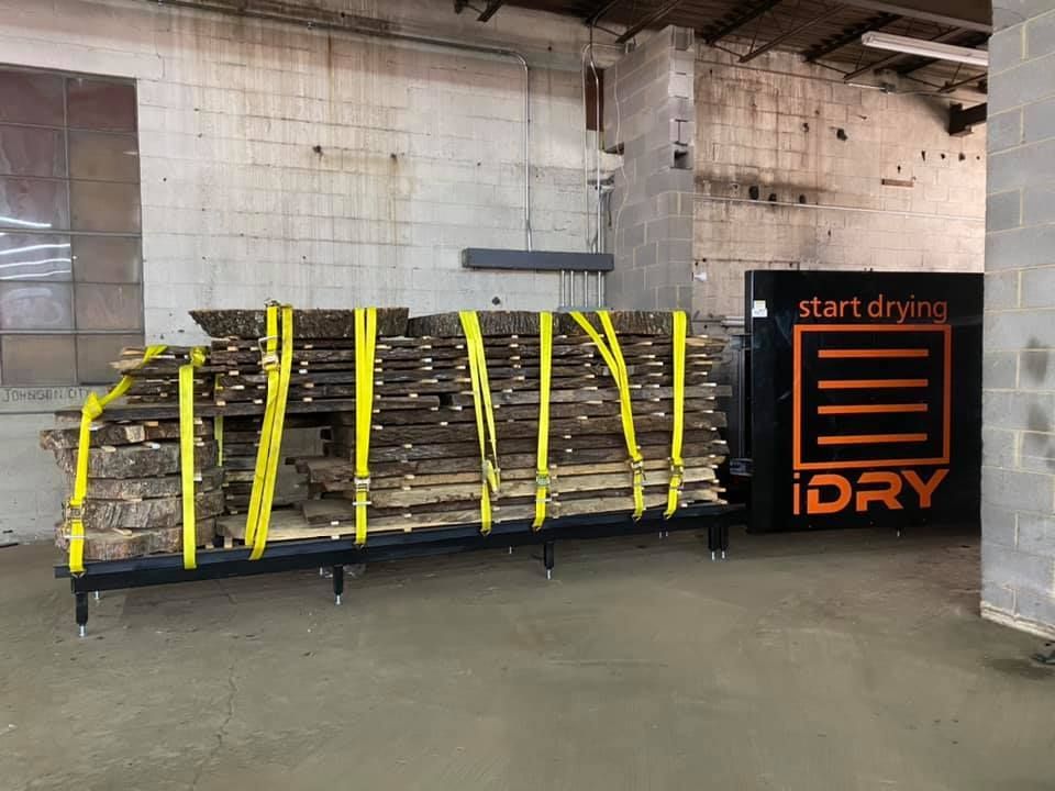 Strapped vacuum kiln load ready for drying.