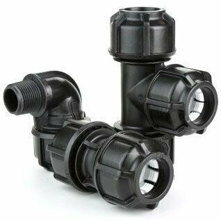 a couple of black plastic pipe fittings on a white background .