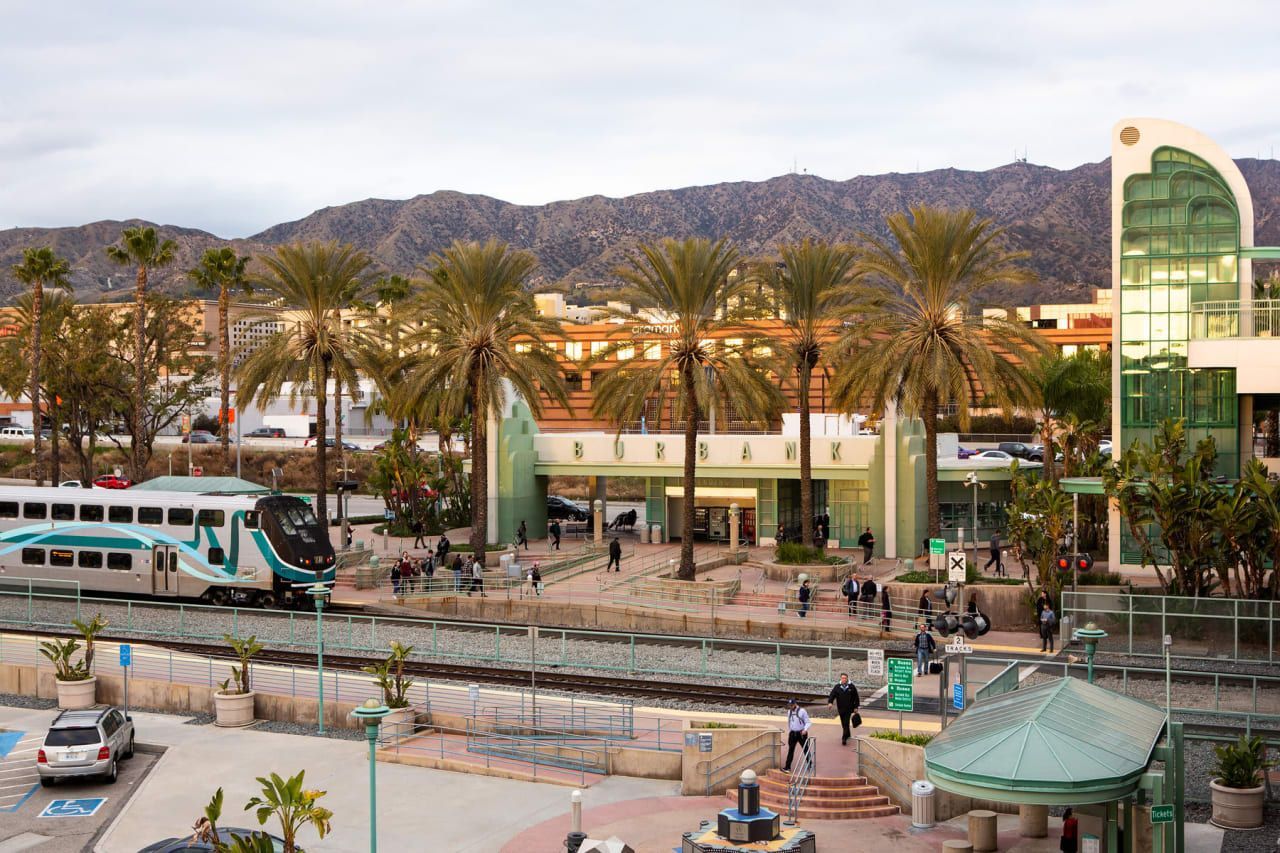 Burbank, CA community with palm trees and train station, Burbank real estate