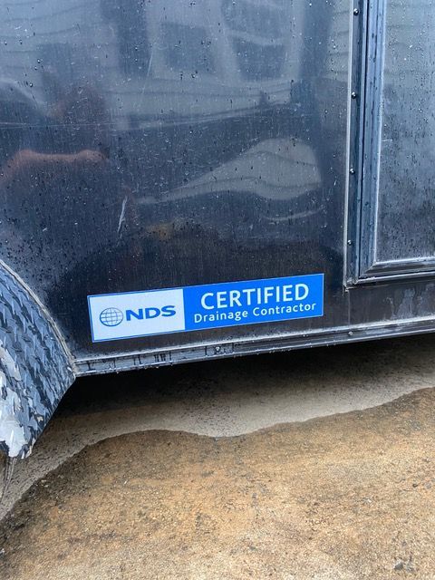 NDS Certified Drainage Contractor sticker on SouthernGrounds Landscaping service van.