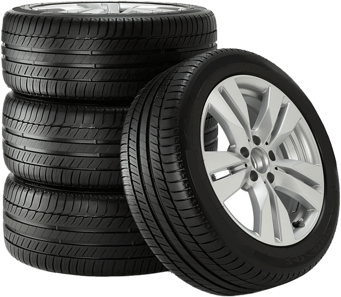 A stack of three black tires behind a single tire mounted on a silver multi-spoke wheel.