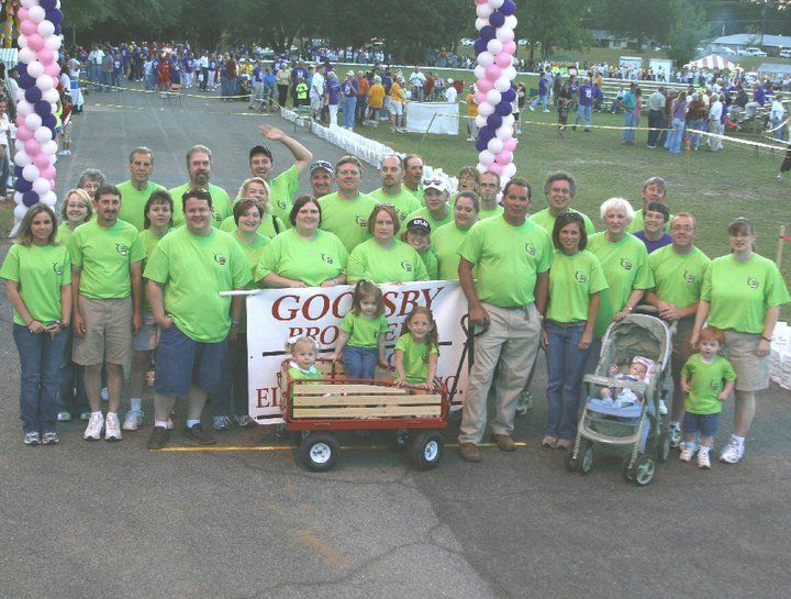 Group Of People Wearing A Green Shirt — Enterprise, AL — Goolsby Bros Plumbing & Electrical, Inc.