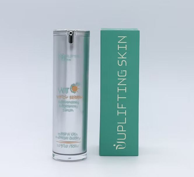 Silver skincare bottle and green box, product called