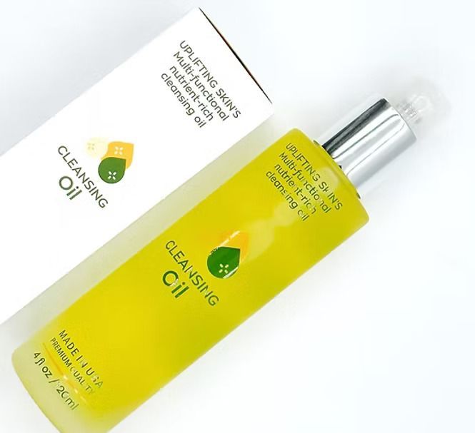 Yellow cleansing oil bottle with white box, labeled