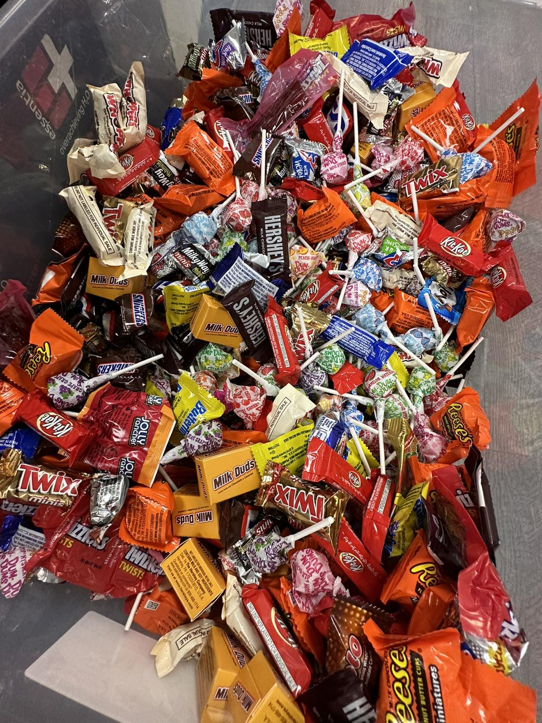 A pile of candy is sitting on top of a table.
