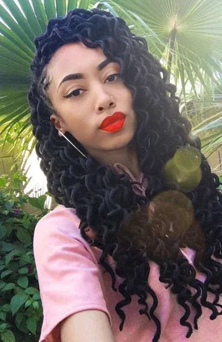 Photo of a girl with a soft dread crotchet hairstyle