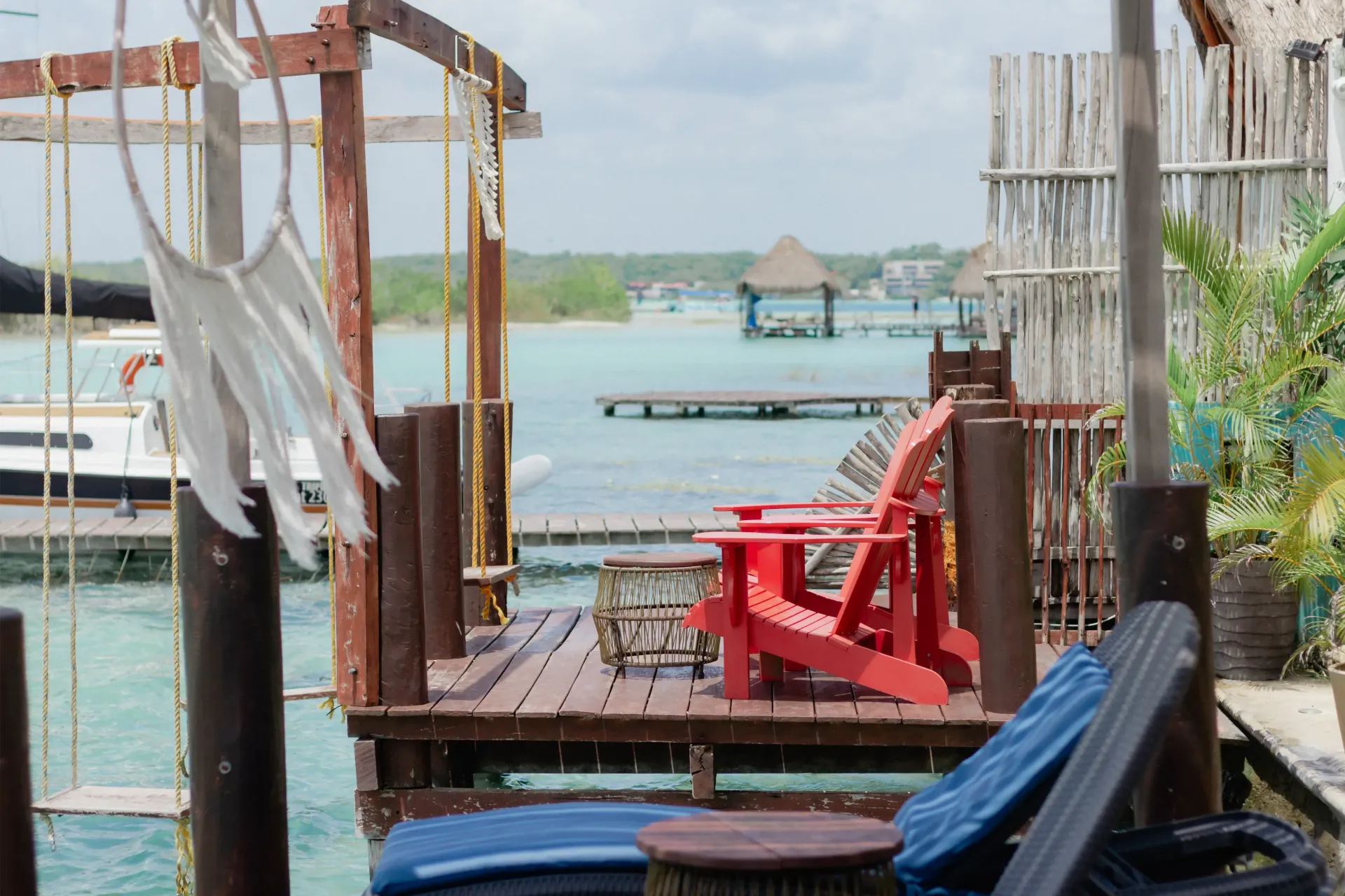 A beach with chairs and umbrellas on it