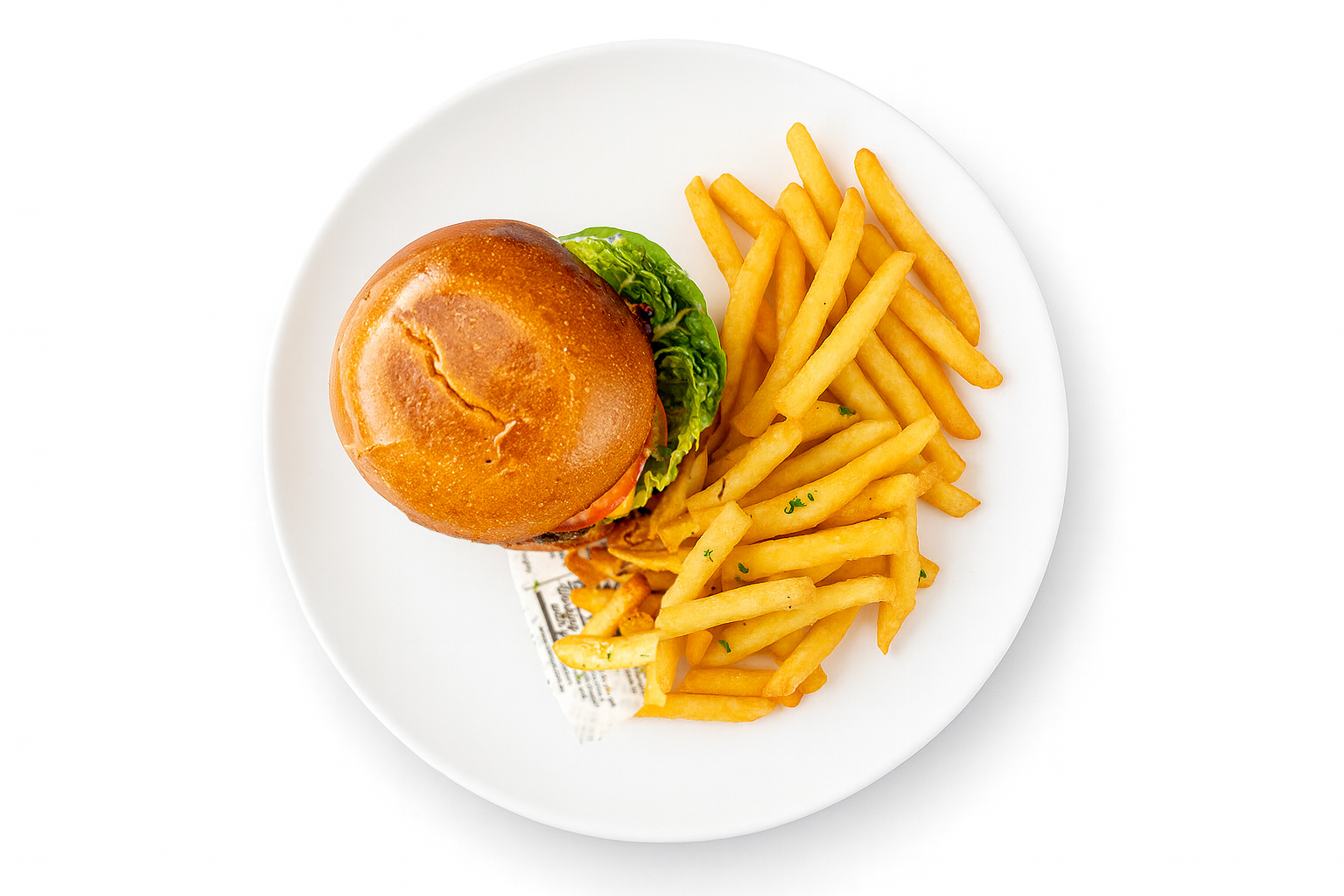 Burger on a bun with lettuce, served with french fries on a white plate.