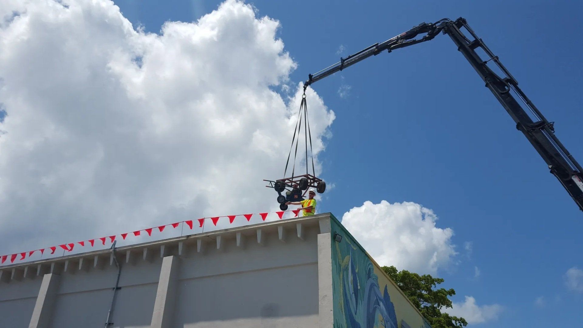 Equipment Being Lifted to Roof — Key West, FL — Keys All Area Roofing & Construction