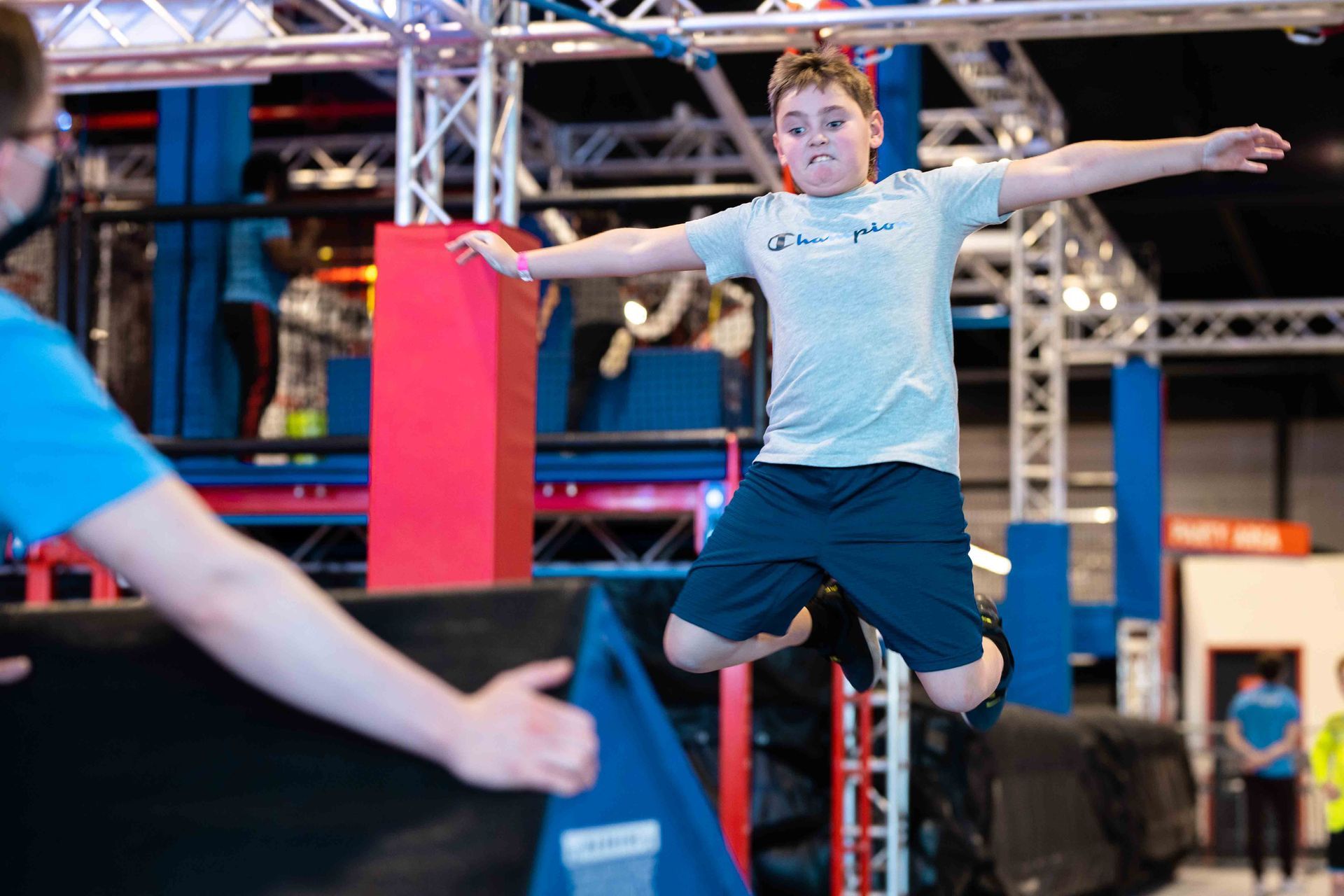 Kids enjoying indoor ninja warrior obstacles at Carolina Ninja Academy in Huntersville NC