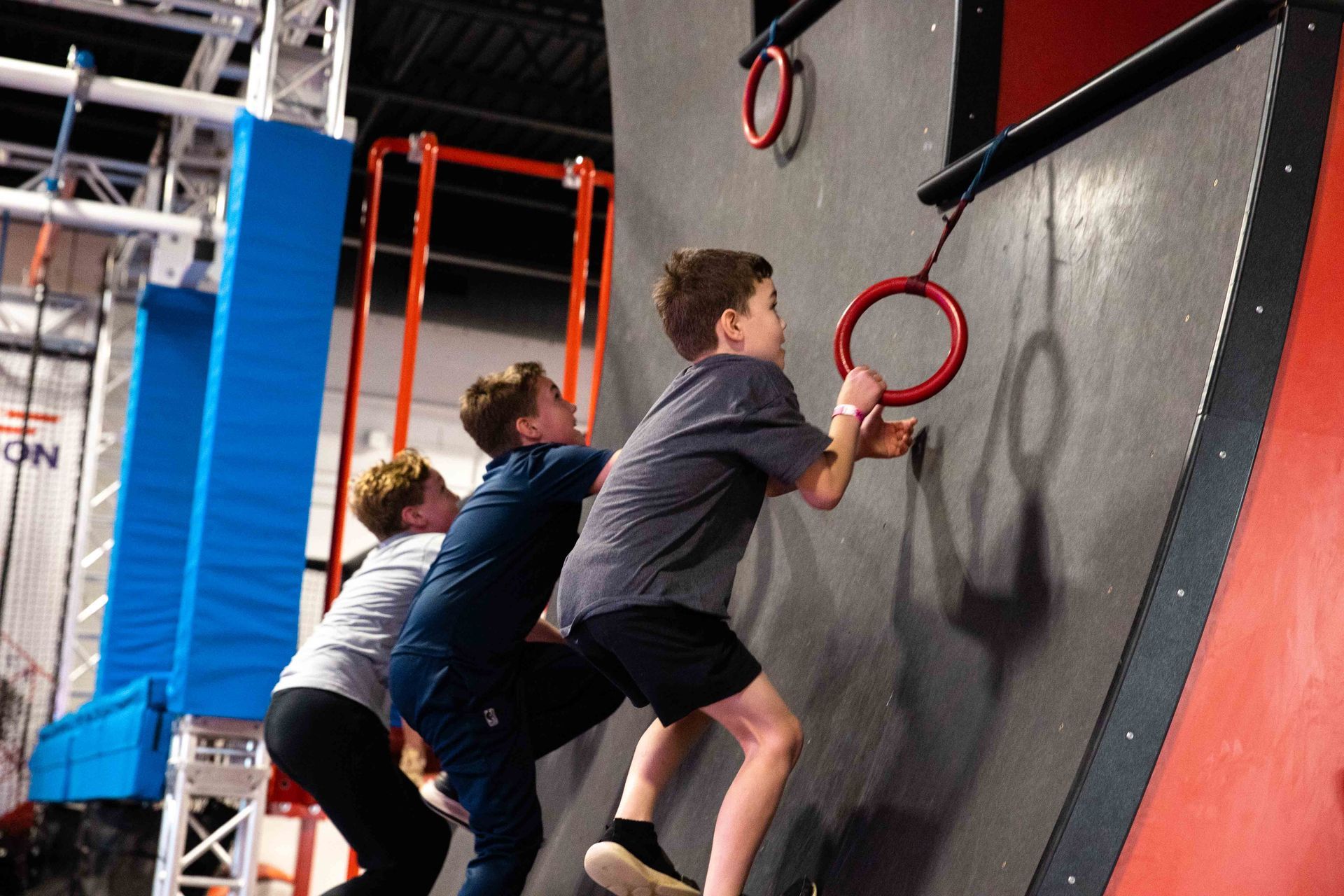Kids enjoying indoor ninja warrior obstacles at Carolina Ninja Academy in Huntersville NC