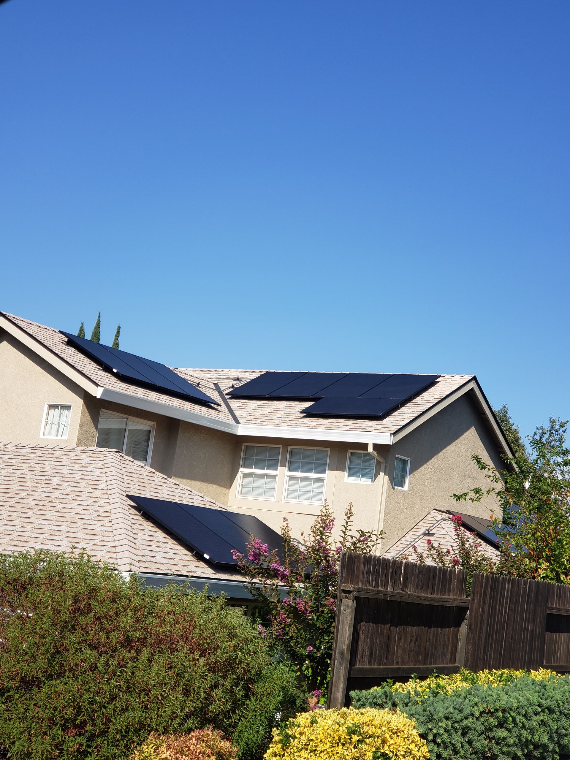 Home with solar in a neighborhood