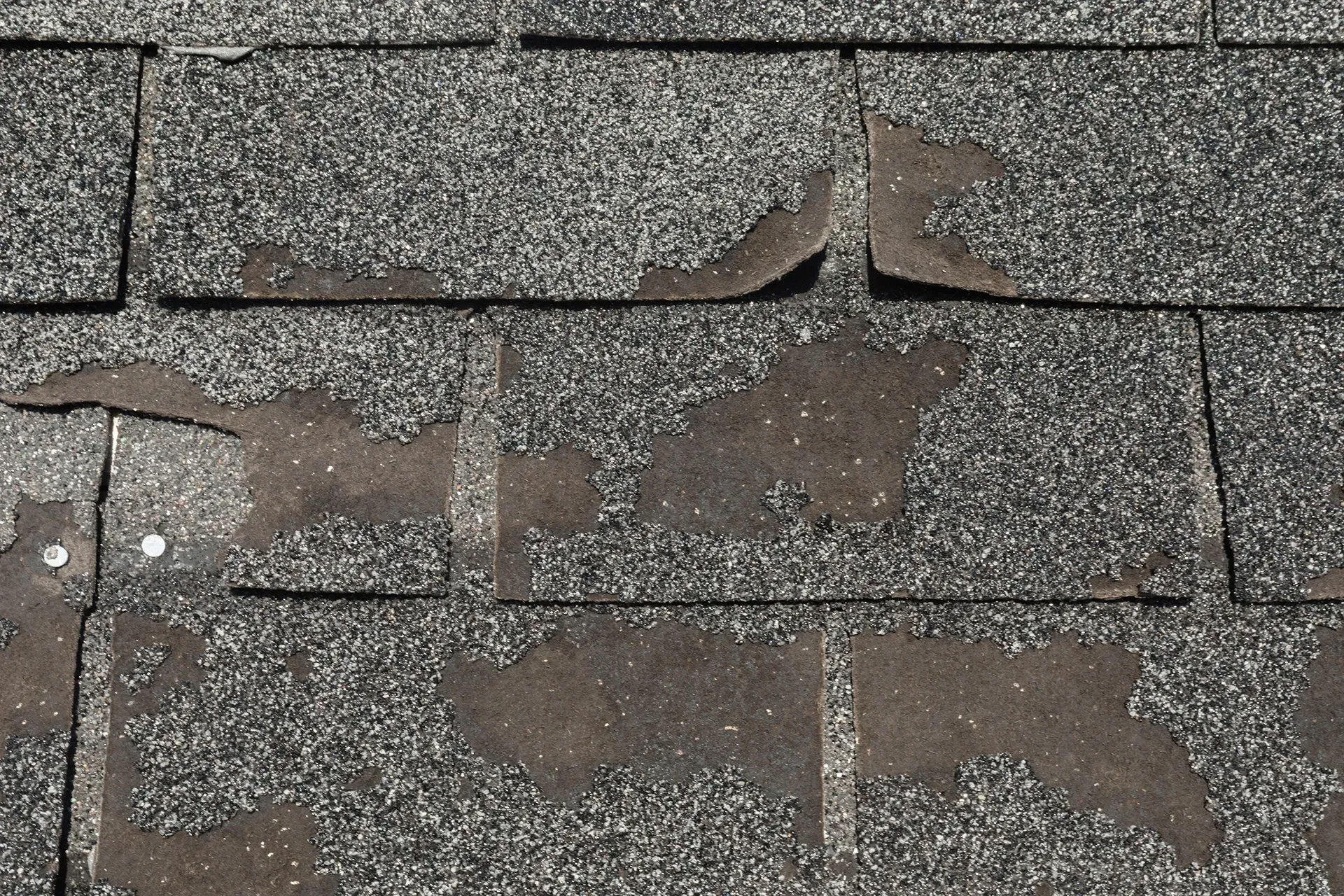 Old roof shingles showing wear