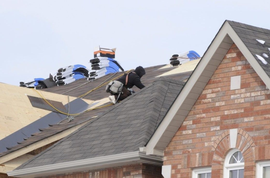 Roofing work being done on a home