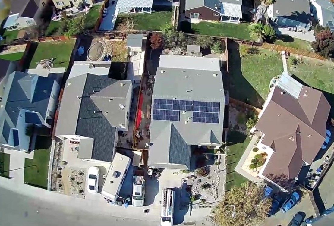 Solar panels on a home undergoing some remodel work