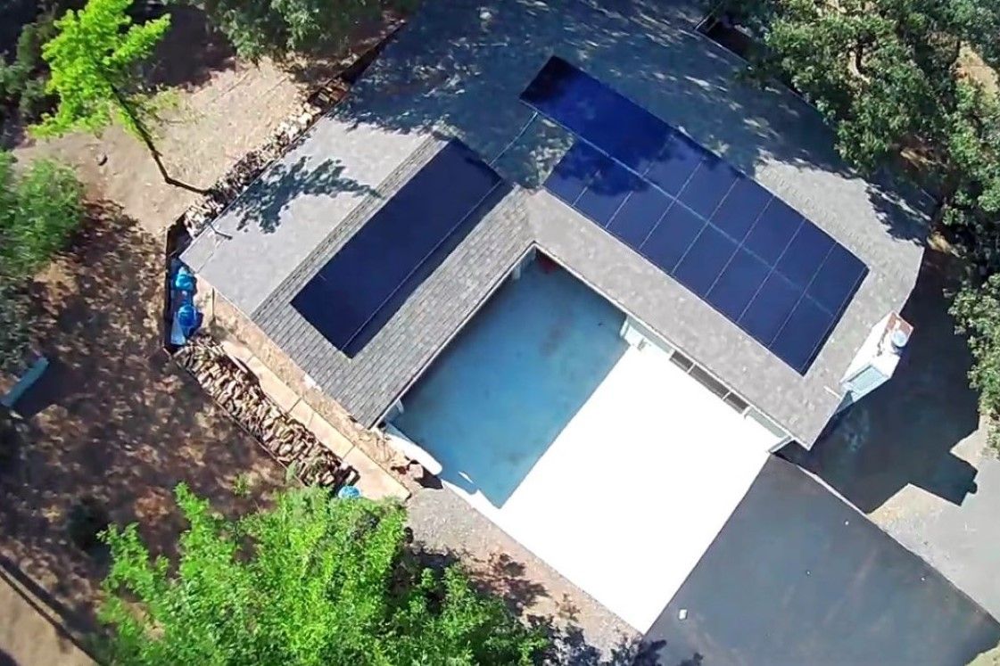 Home with solar tiles on roof