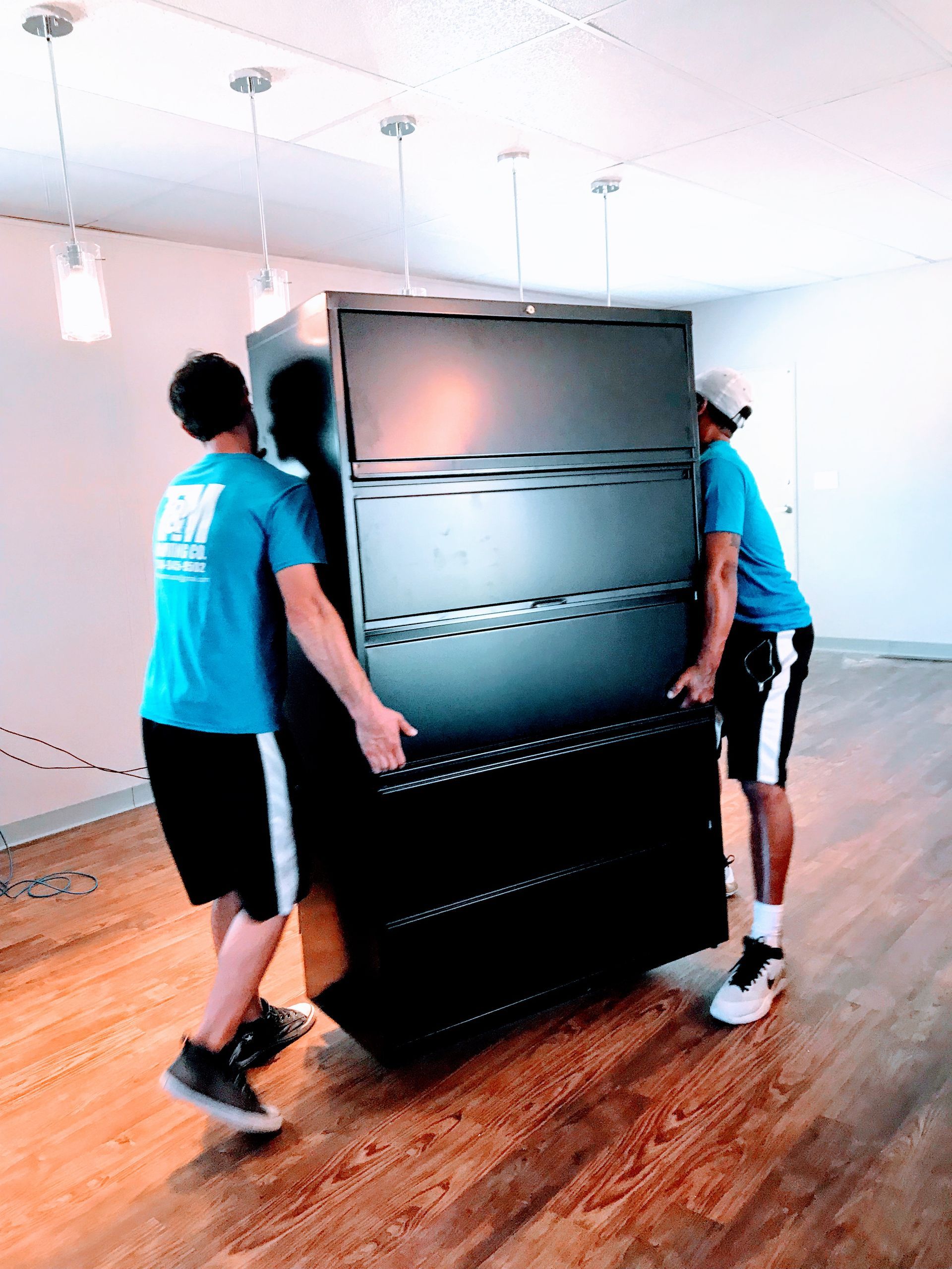 a piano is wrapped in plastic wrap in a room