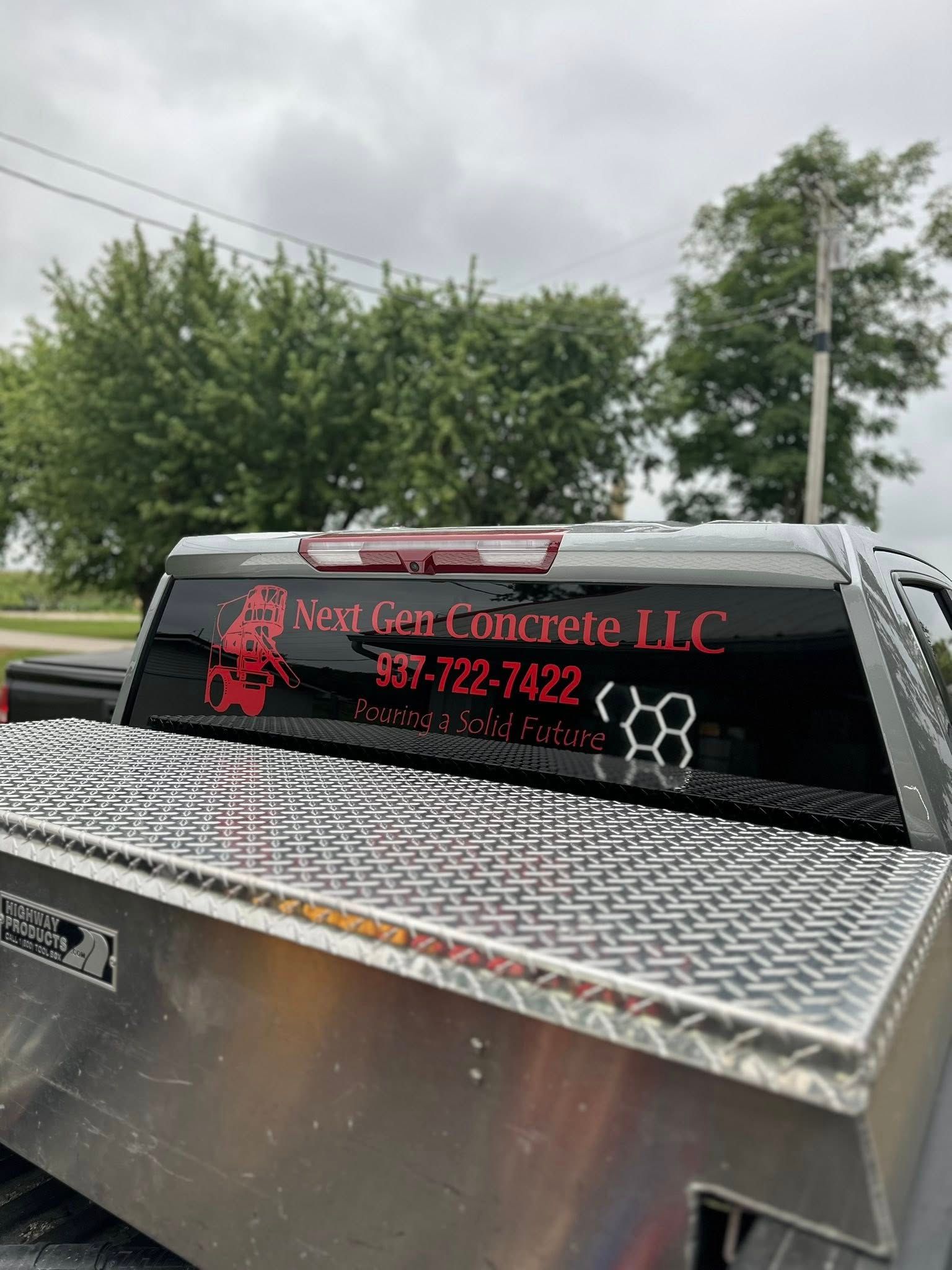 A truck rear window with red text: 