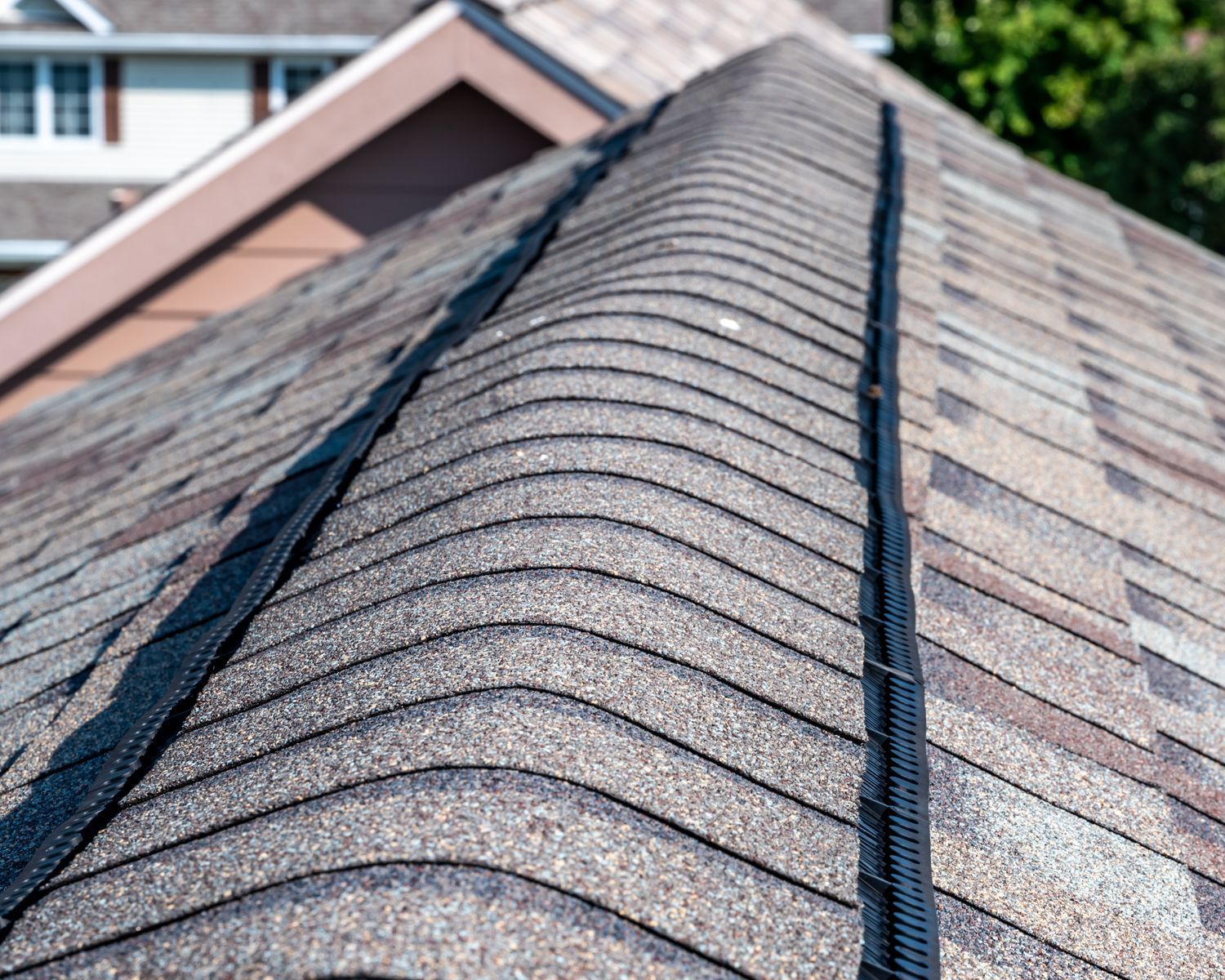 A close up of a roof with shingles on it