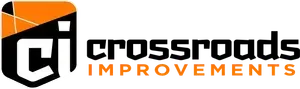 Crossroads Improvements logo with black and orange text and a stylized house icon