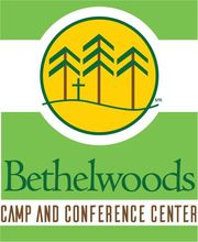 Bethelwoods Camp and Conference Center logo: green, yellow, trees, cross, and text.