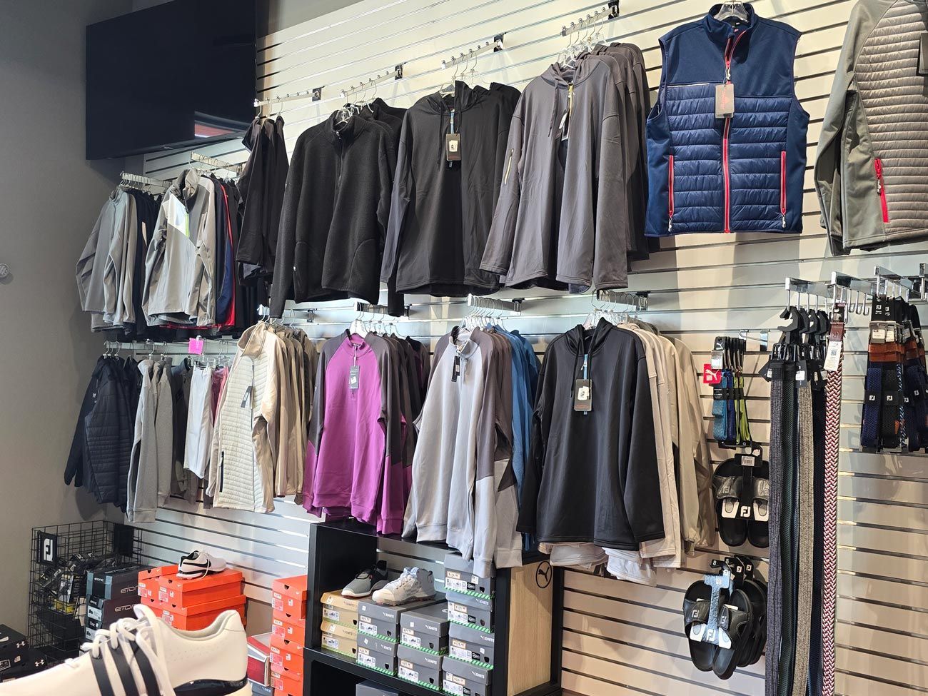A store filled with lots of clothes and shoes.