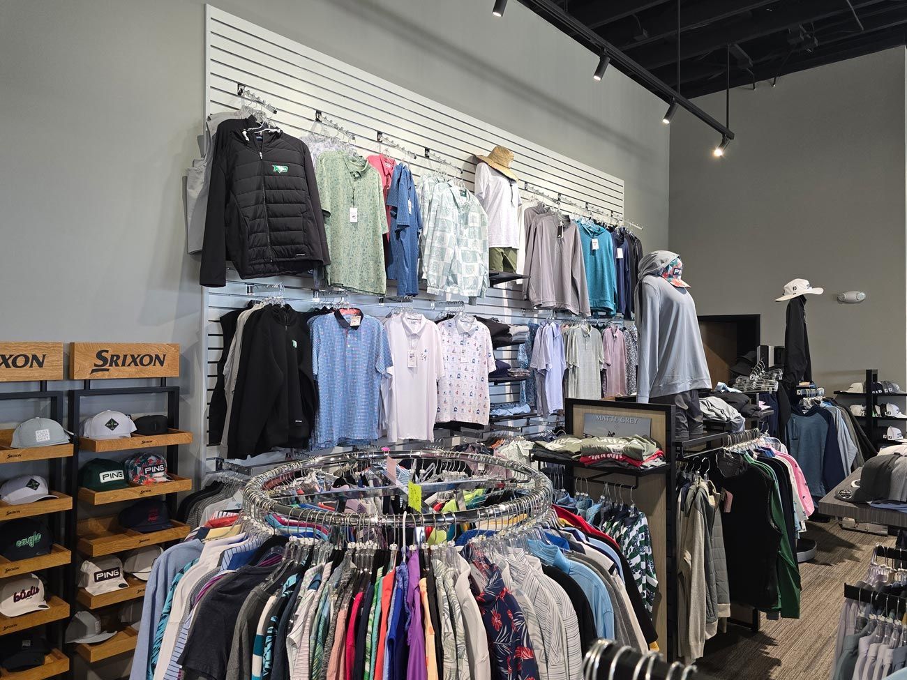 A store filled with lots of clothes and hats.