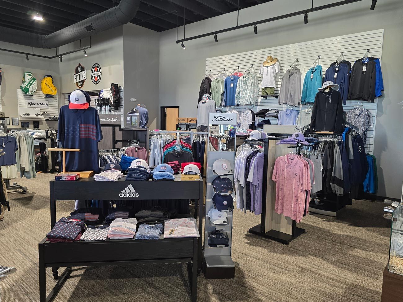 A store filled with lots of clothes and hats.
