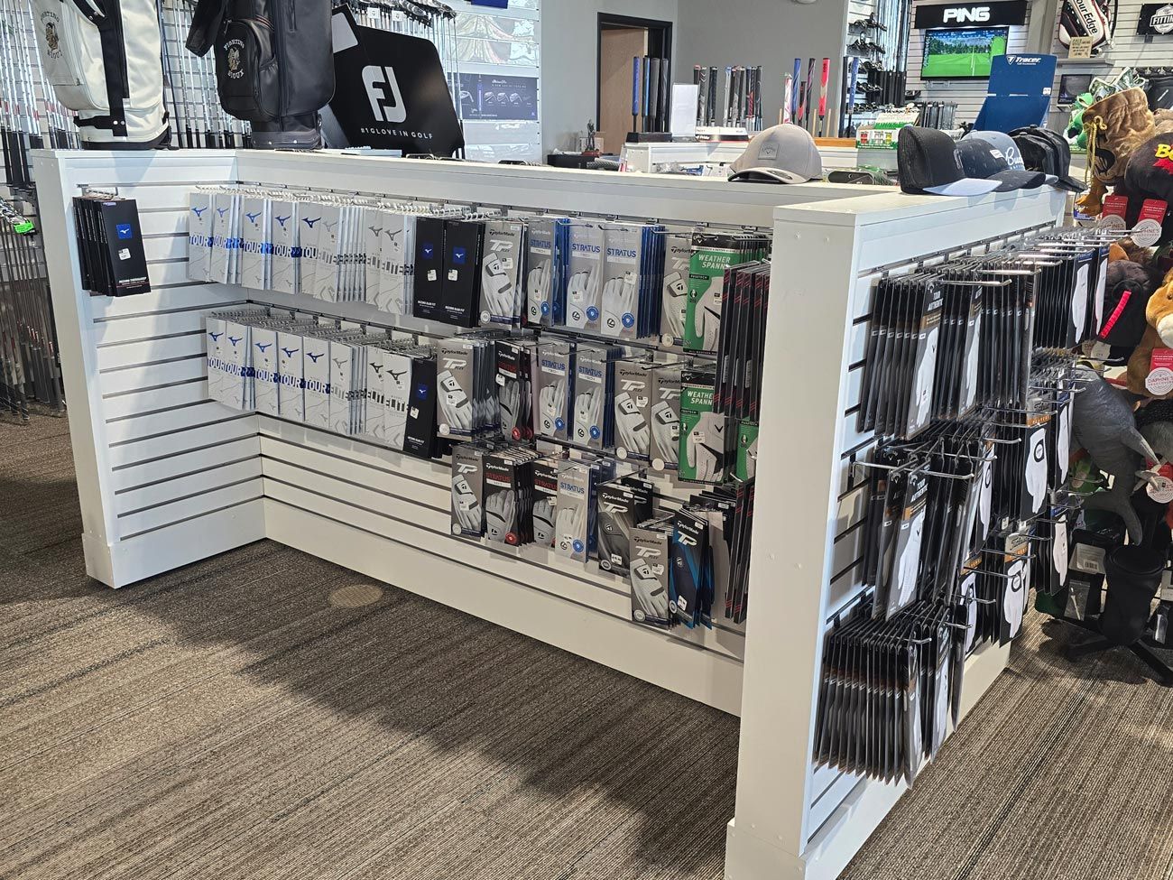 A store filled with lots of golf equipment and accessories.