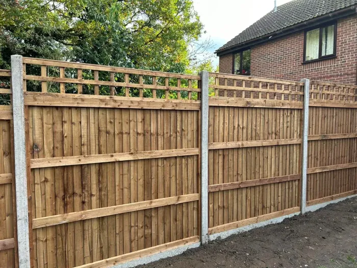 Trellis fencing installation with concrete fence posts in Rotherham