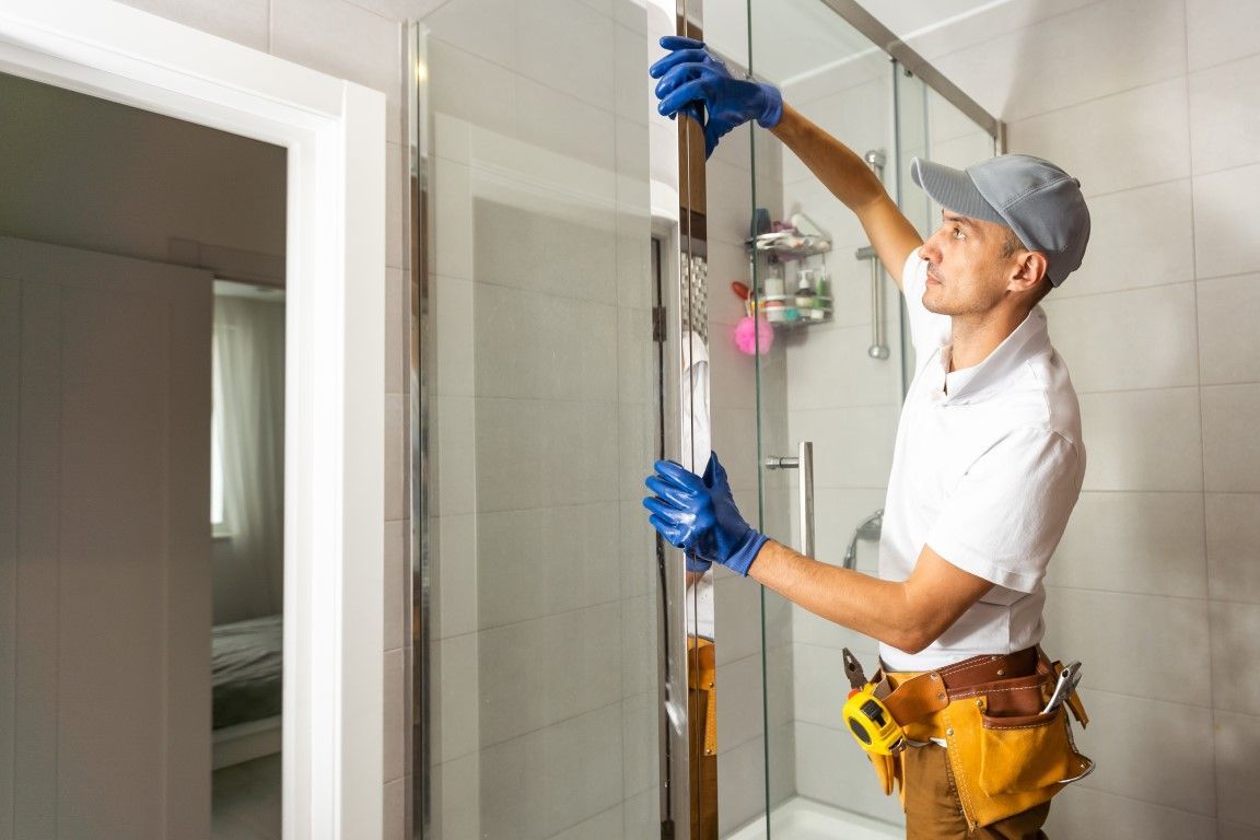 An image of a man remodeling shower in Puyallup, WA