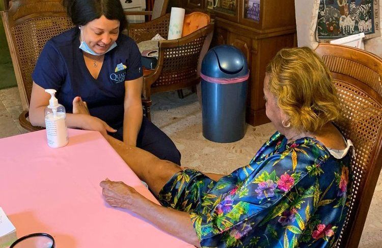 image of home health aide providing compassionate care services for a senior client.