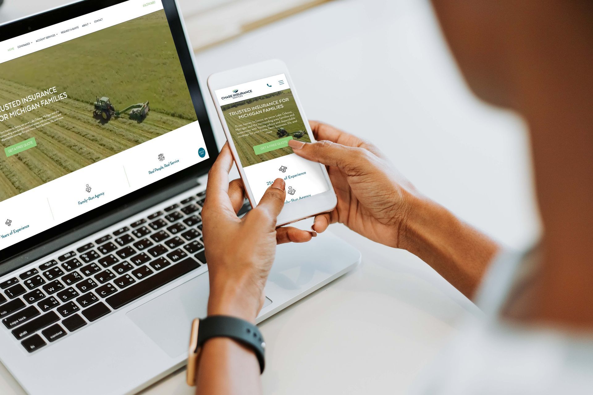 Person using a phone and a laptop to view Chase Insurance Services website homepage.