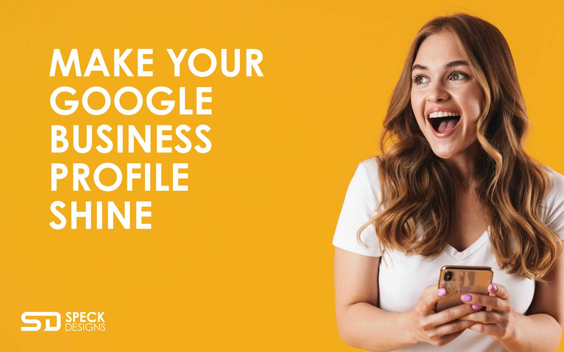 A woman is holding a cell phone in her hand and smiling.