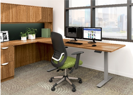 Office with wooden desk, two monitors, green chair, and a window.