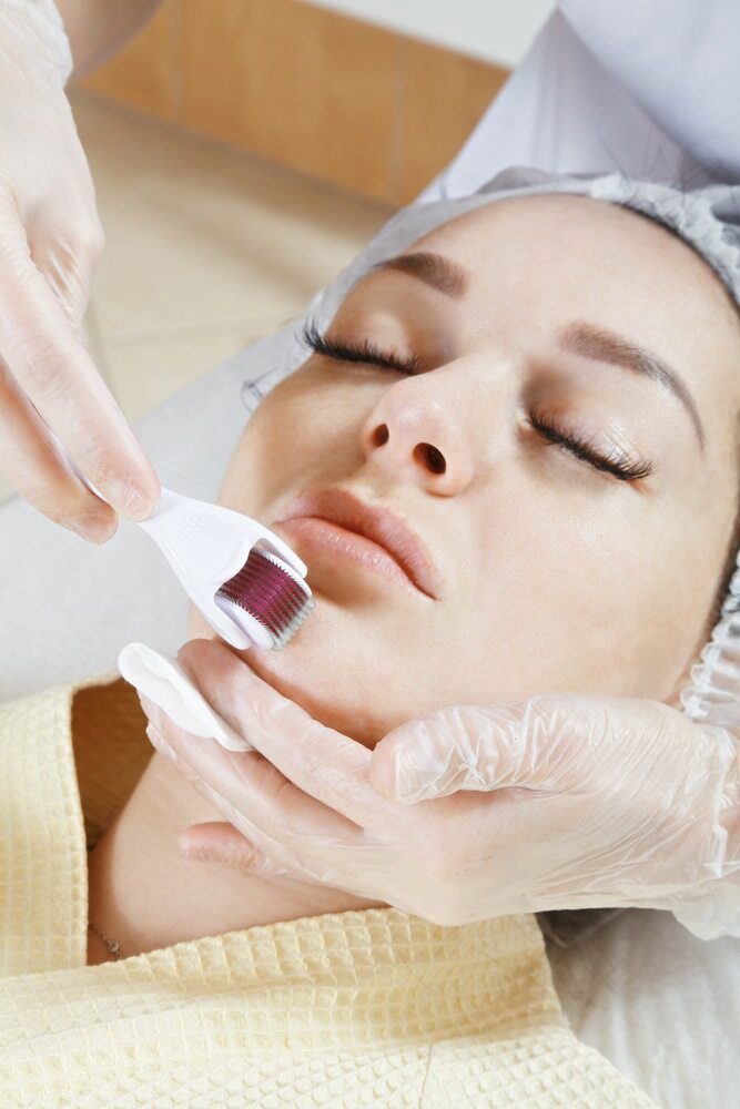 A Woman Is Getting A Facial Treatment  — Xtreme Rejuvenation Clinic, Medispa & Beauty Therapy In Maryborough, QLD