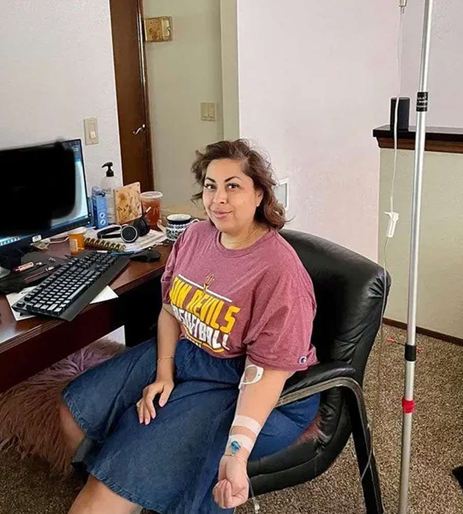 woman receiving mobile IV therapy for dehydration at home