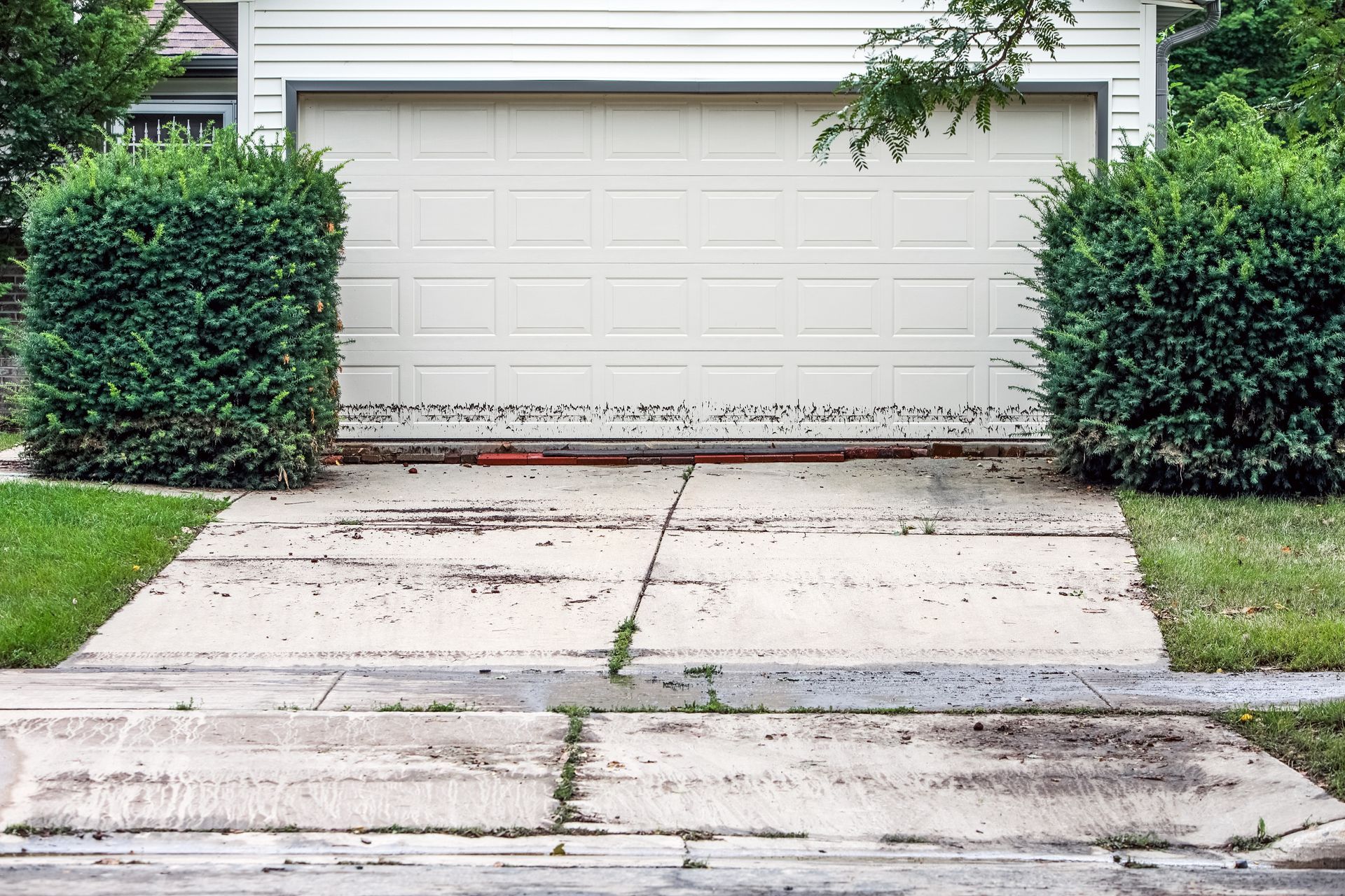 water runoff damages Castle Rock driveways