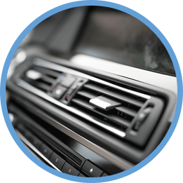 A Close up Of a Car Air Vent in A Blue Circle — In CoolAir Auto Care Salamander Bay NSW, 2317