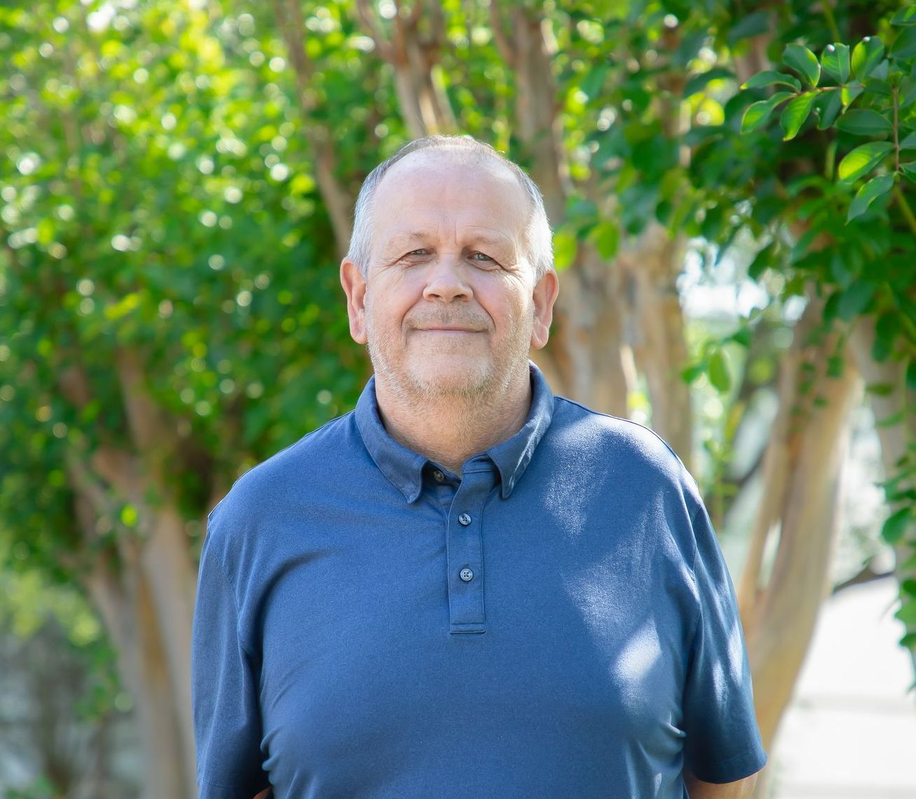 Corporate headshot of Tony Alcock