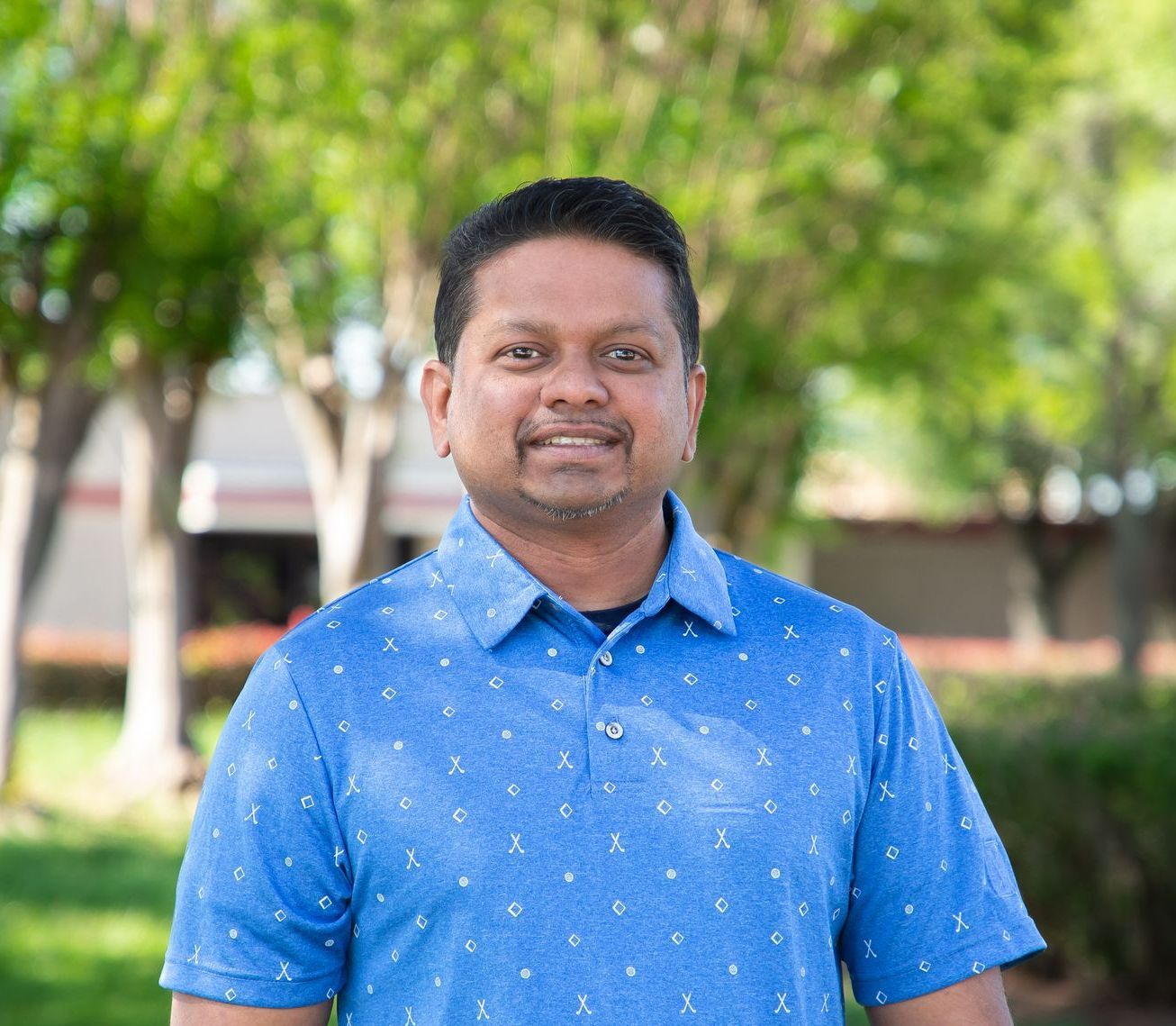 Corporate headshot of Rohit Kissoon