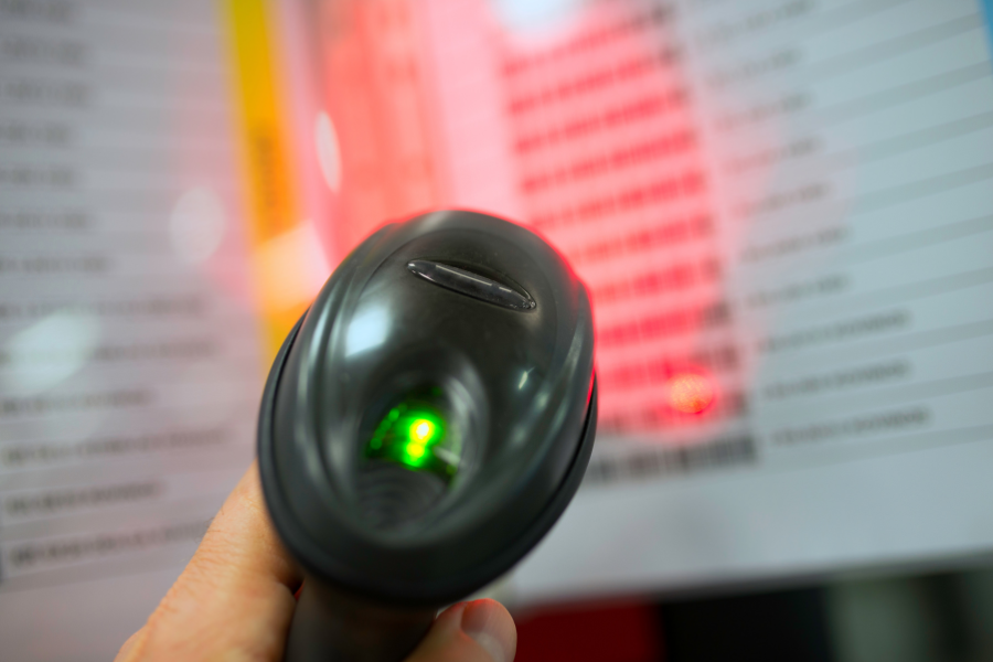 barcode scanner scanning a list of upcs
