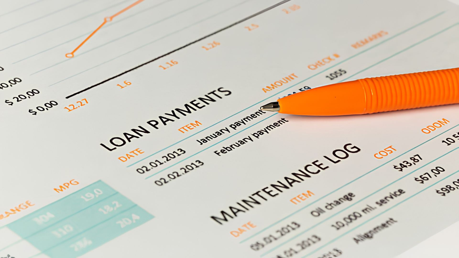 Close-up of a financial form with a bright orange pen highlighting loan and maintenance log details.