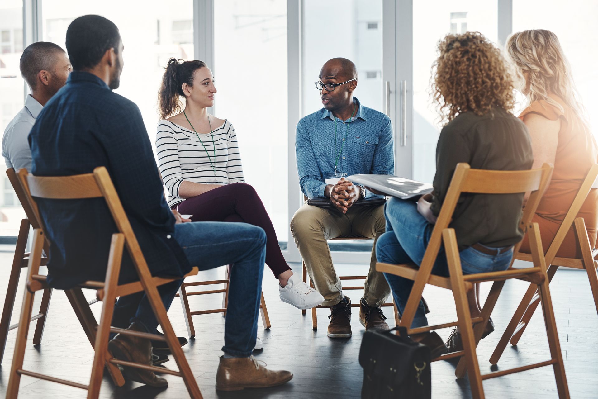 Instructor leads a small group discussion during a substance abuse education or recovery course session. Instructor leads a small group discussion during a substance abuse education or recovery course session.