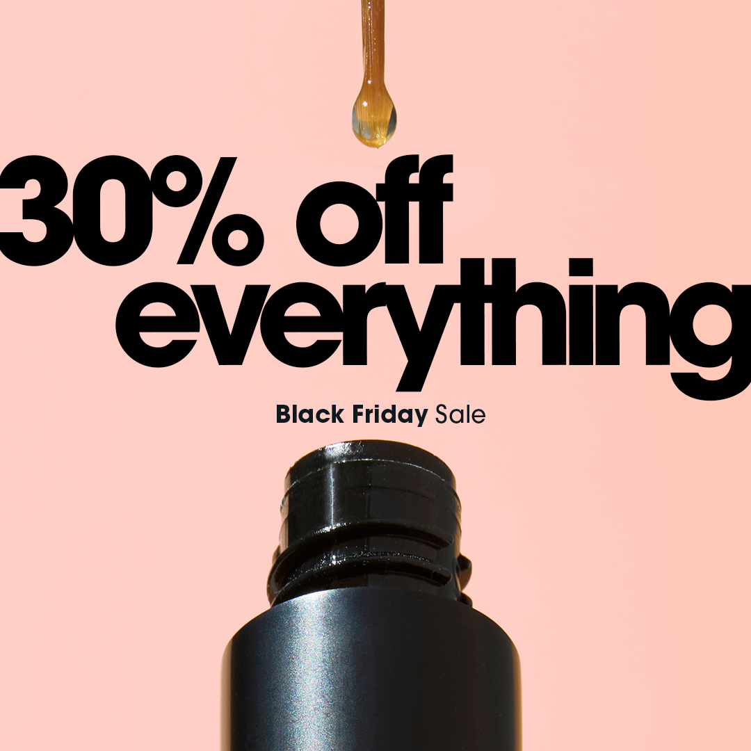30% off everything Black Friday sale with a black bottle and dripping liquid against a peach background.