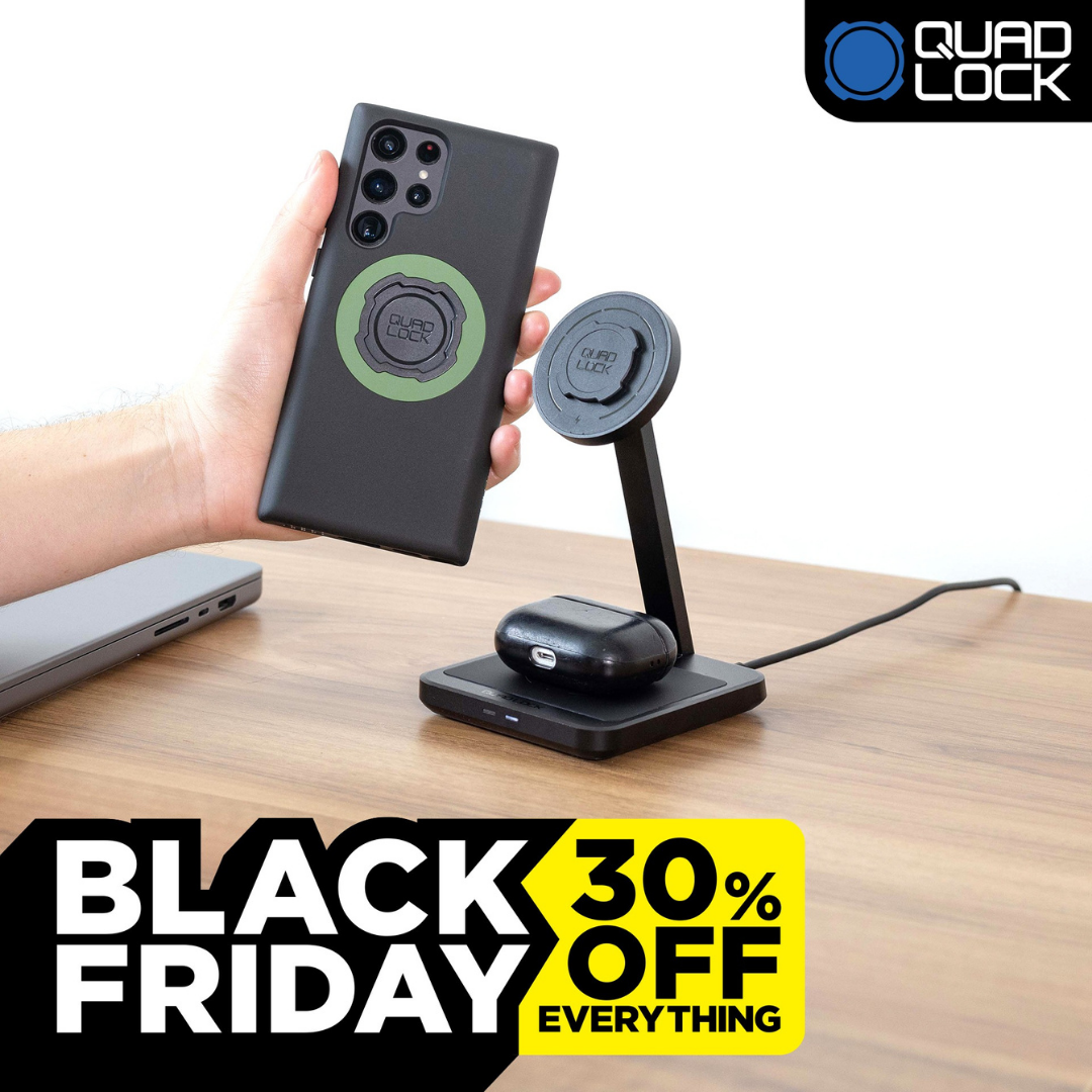Black Friday sale: Quad Lock wireless charging stand with phone and earbuds, 30% off.