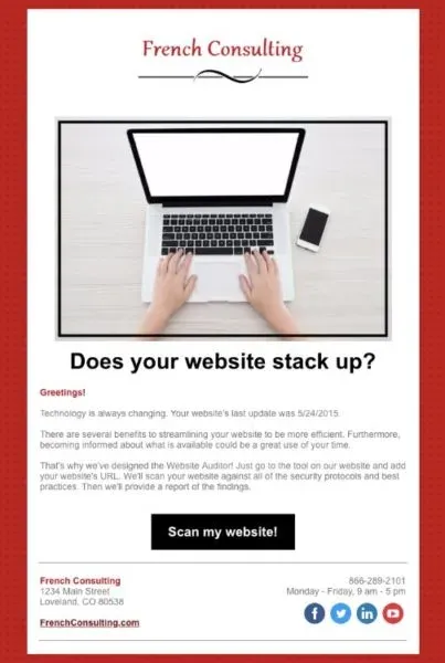 A person is typing on a laptop computer.